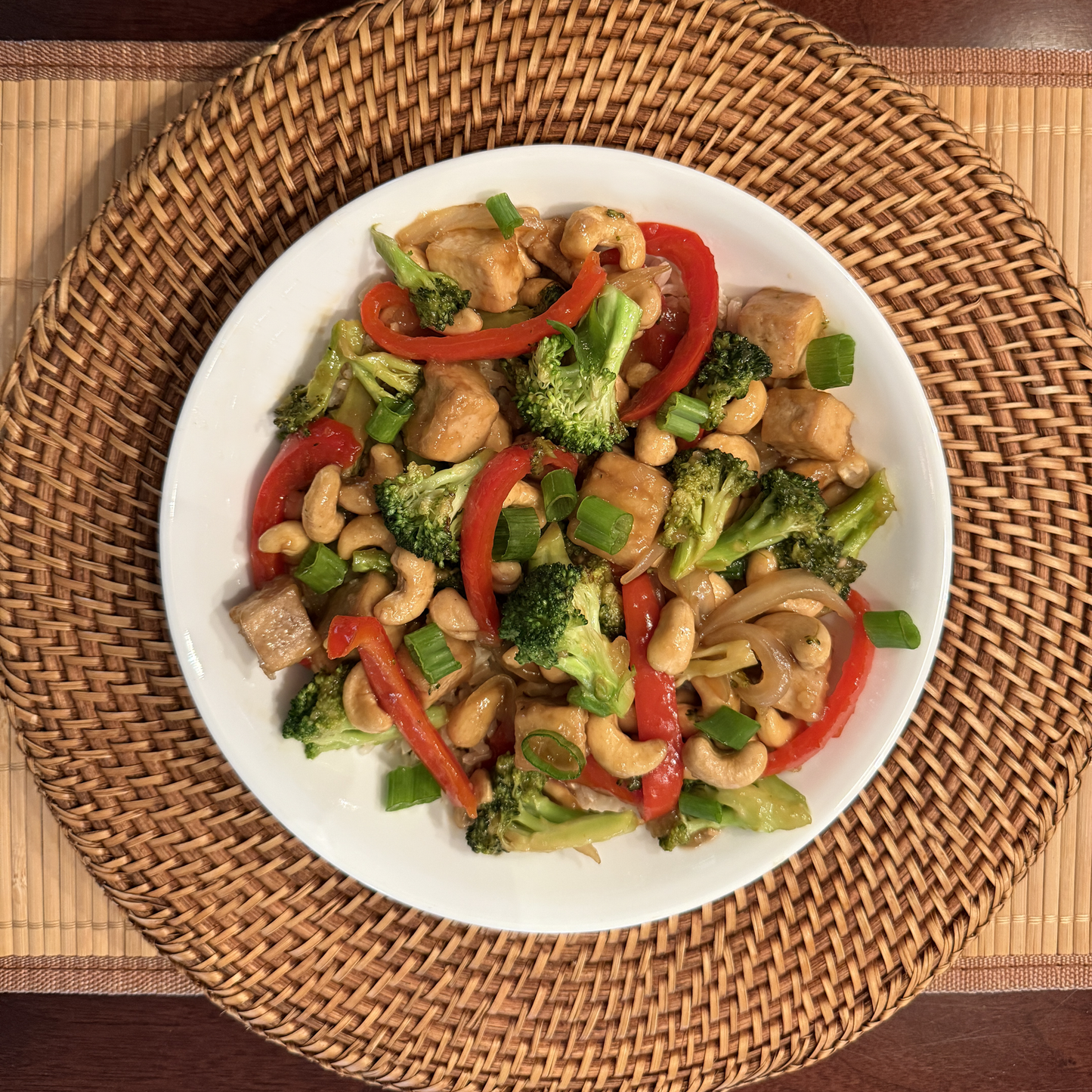 Cashew tofu stir fry meal on a white dish