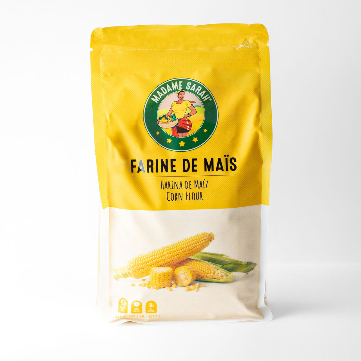 Yellow package of Madame Sarah corn flour and corn illustrations on a white background