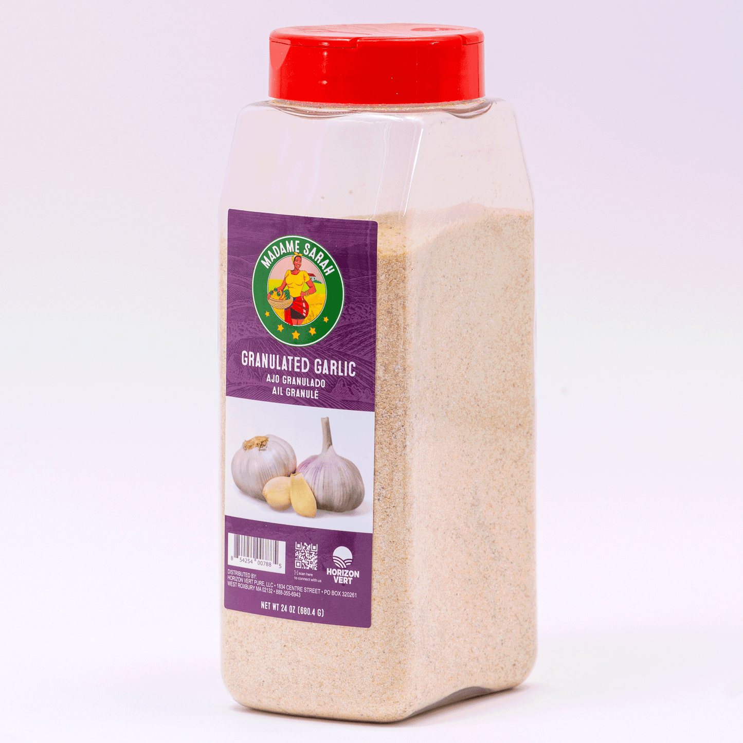 Angled view of Madame Sarah Granulated Garlic bottle