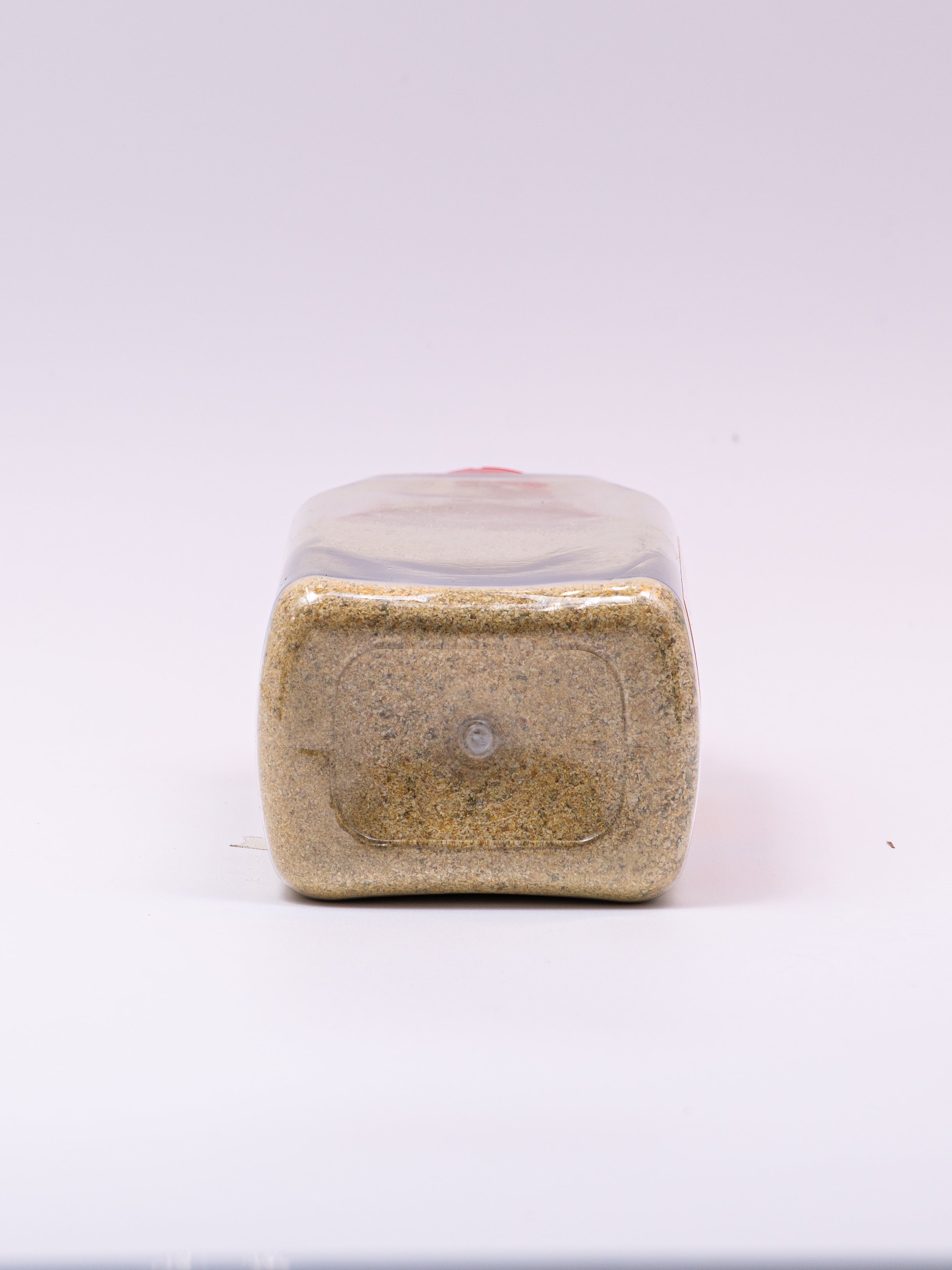 24 ounce container of Madame Sarah Powdered Haitian Epis Seasoning (bottom view)