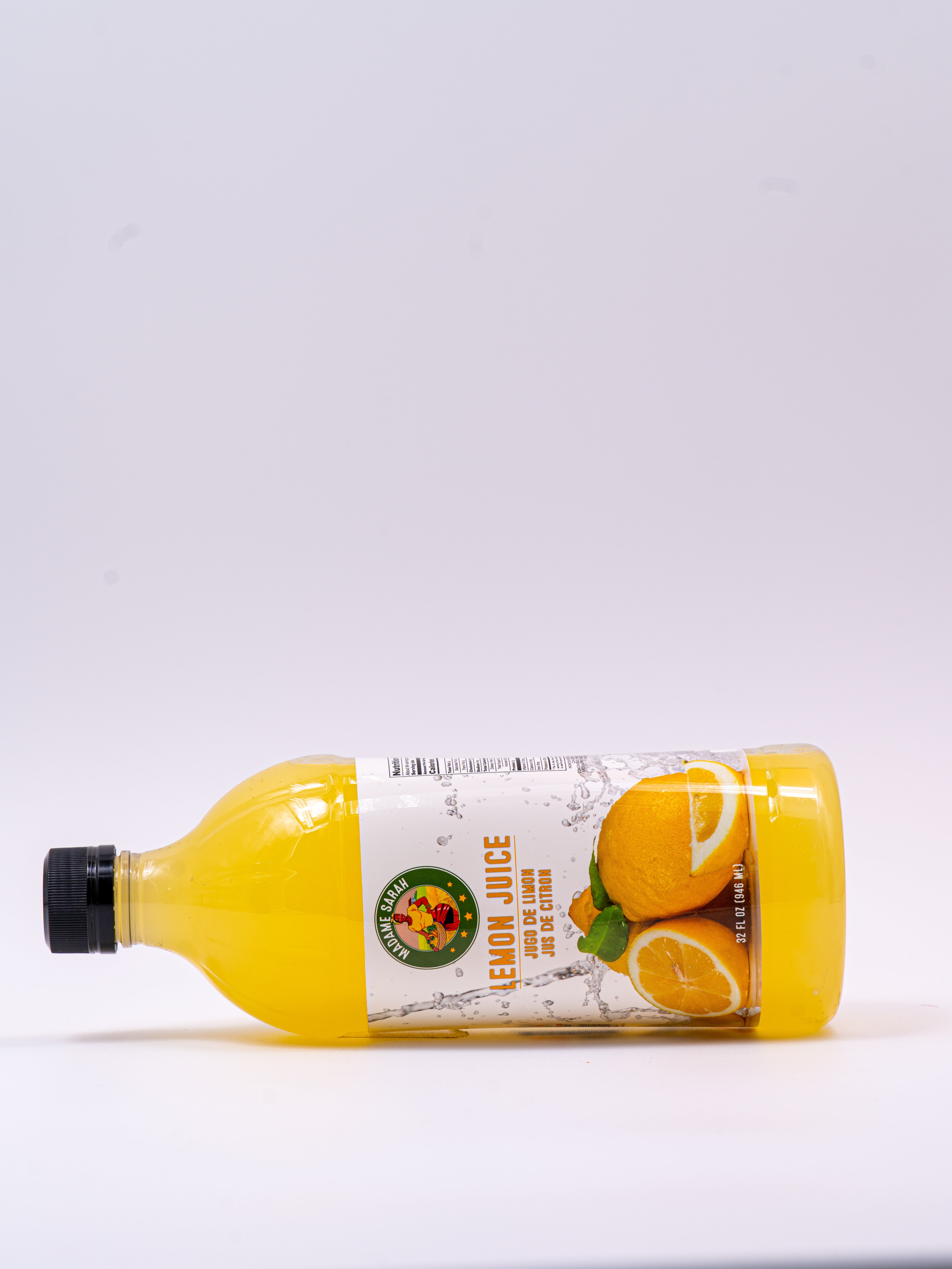 Madame Sarah Lemon Juice bottle on its side